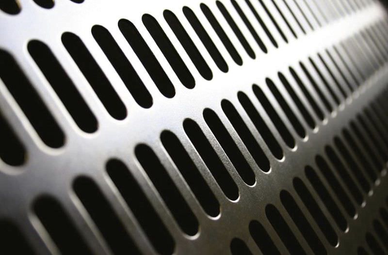 Golden aluminum expanded metal meshes with diamond holes are installed on interior wall.