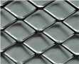 Golden aluminum expanded metal meshes with diamond holes are installed on interior wall.