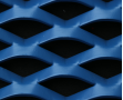 Golden aluminum expanded metal meshes with diamond holes are installed on interior wall.